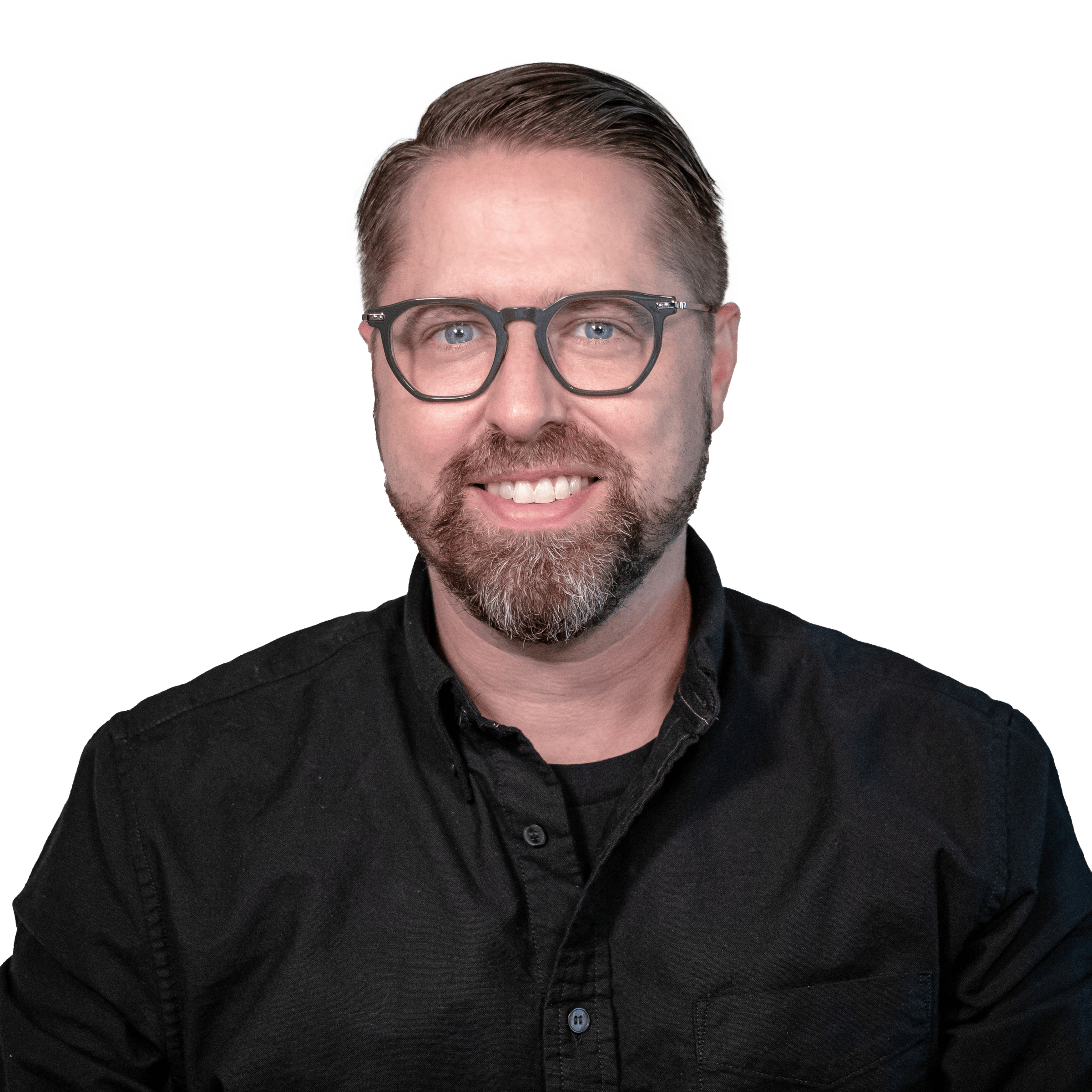 Headshot of Joe Garrison wearing green-rimmed glasses and a black collared shirt.