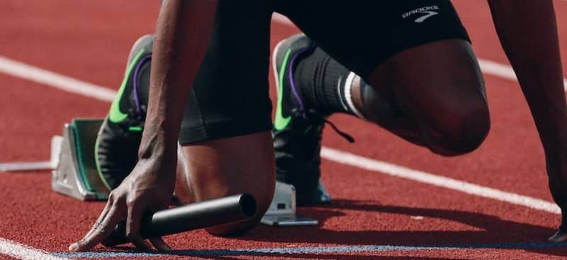 man on running field