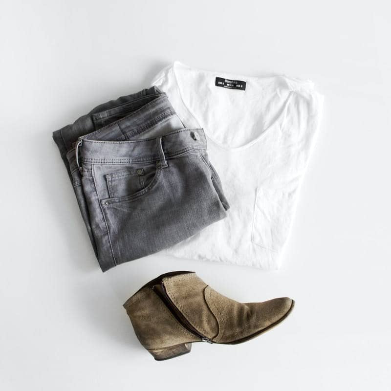 white crew neck t-shirt and brown leather boots