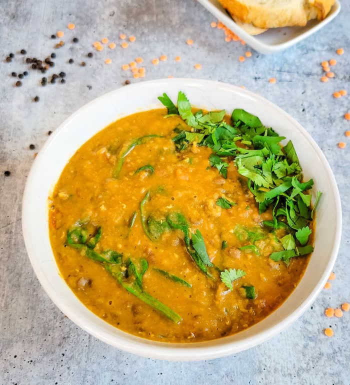 Vegan lentil spinach soup in a bowl