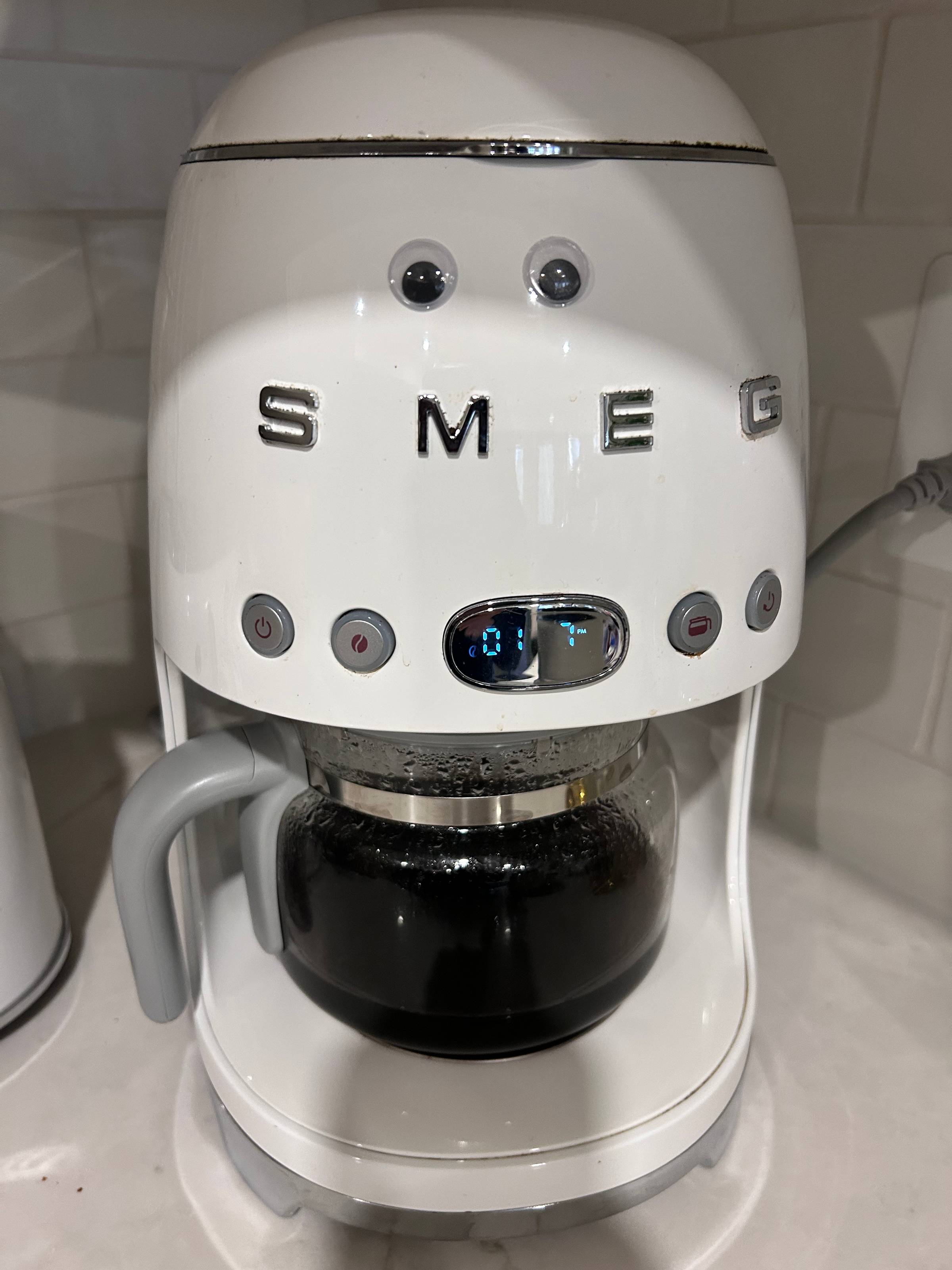 googly eyes on a SMEG coffeemaker