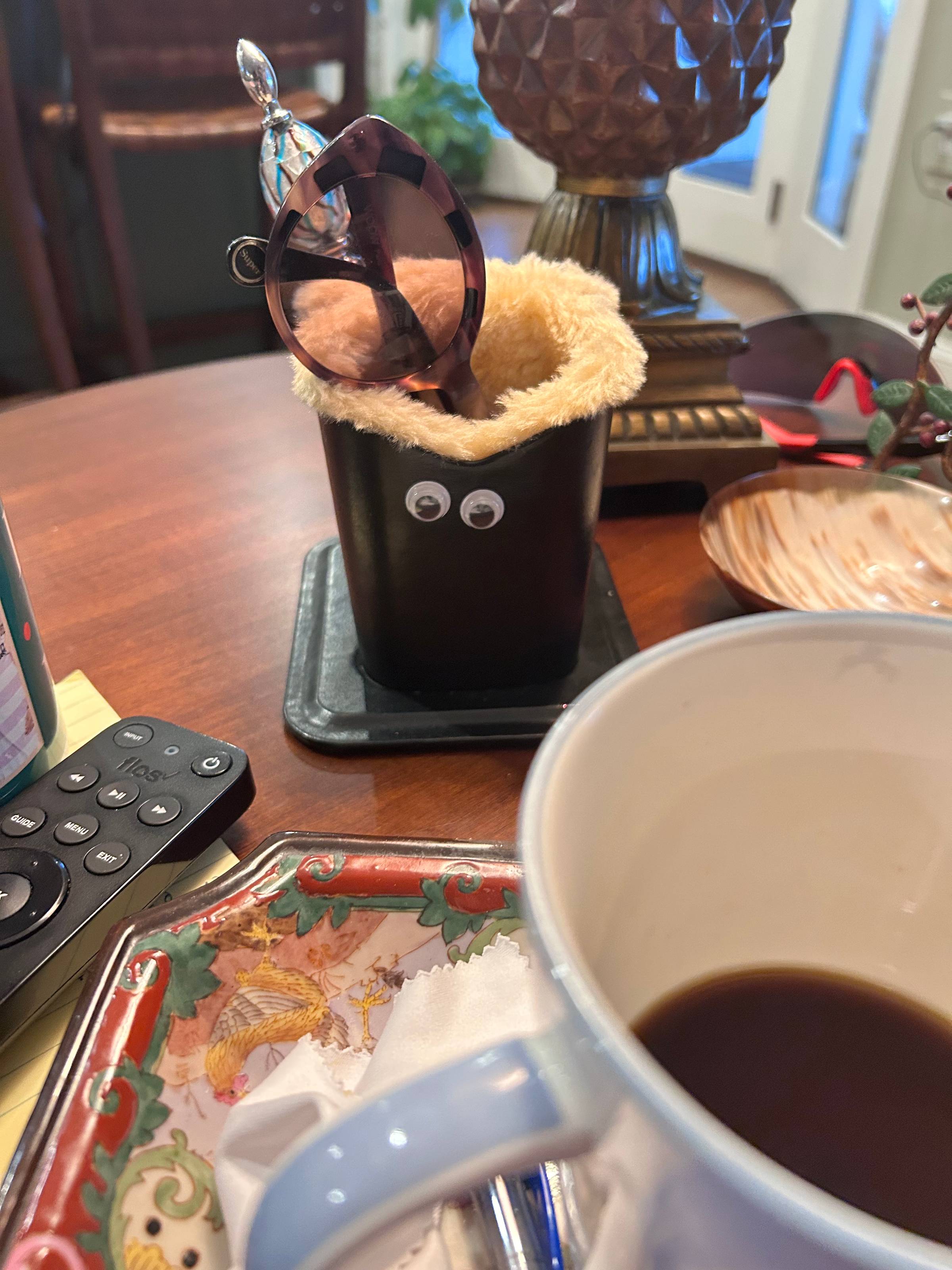googly eyes on a fuzzy. glasses holder