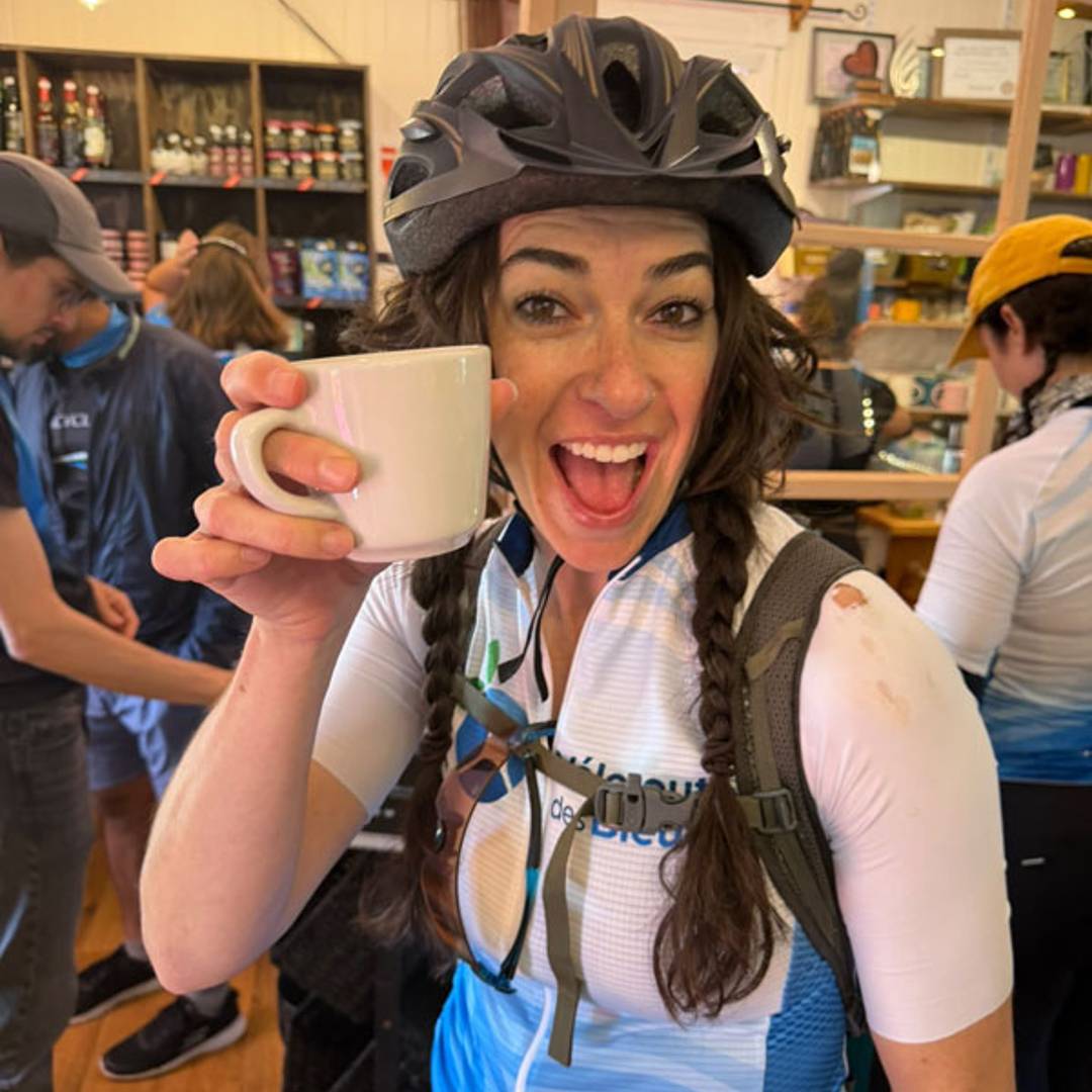 Coffee cheers with a ripped bike jersey
