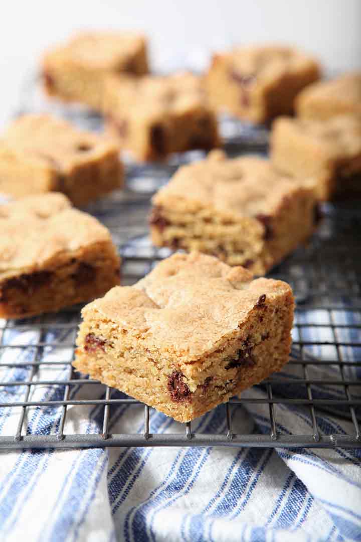 chocolate chip cookie bars on a wire cooling rack