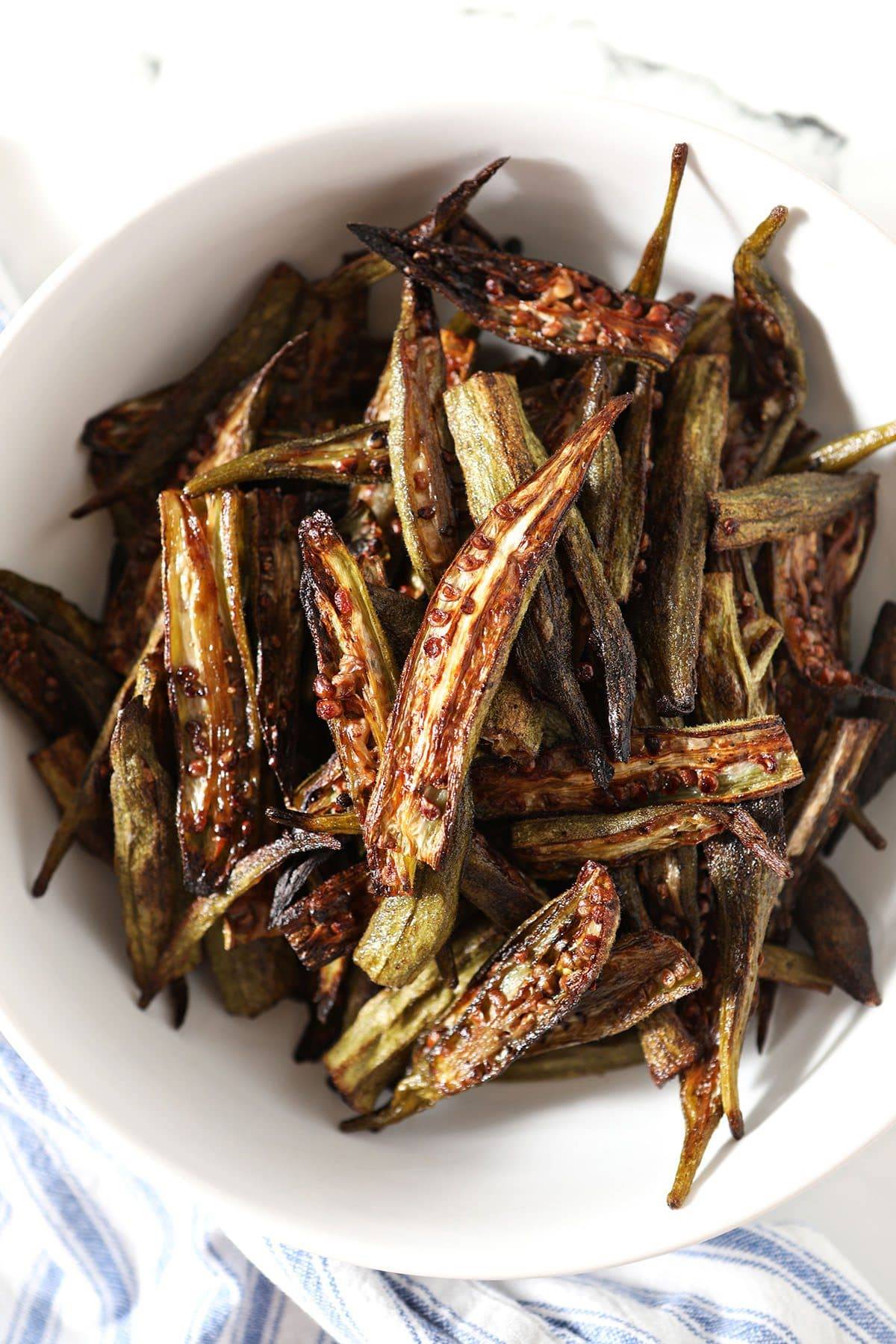 roasted okra in a white bowl