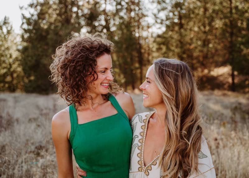 A couple of women standing next to each other