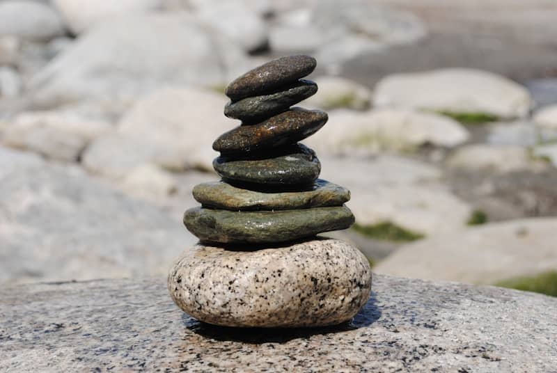 A stack of rocks sitting on top of a rock