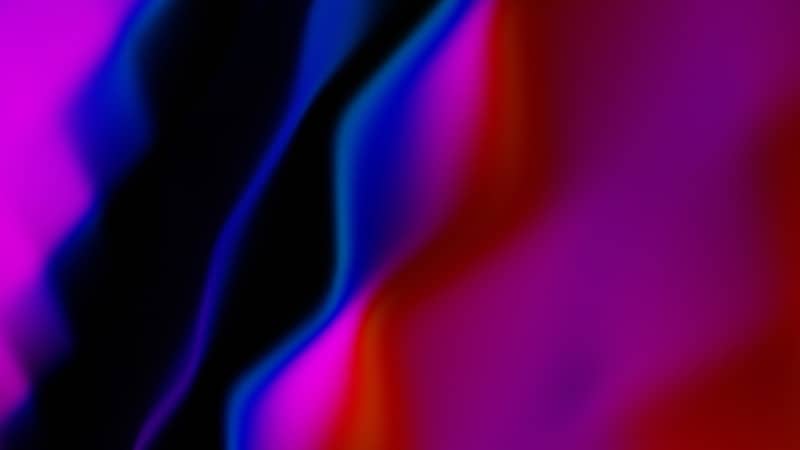 Abstract flowing shapes of vibrant colors.