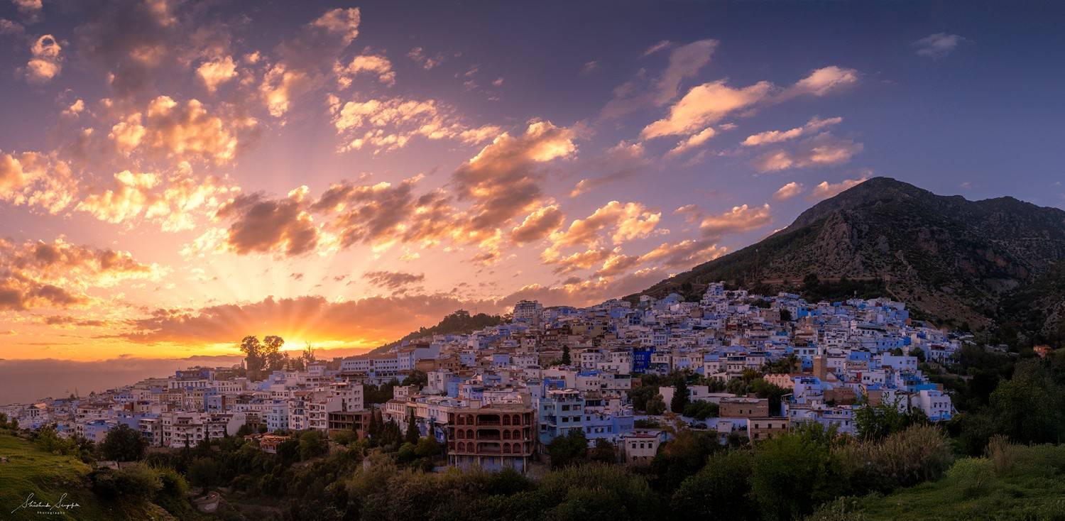 blue city of chefchaouen in morocco africa featuring blue medina alleyways place El Haouta plaza uta el hammam kasbah museum and sunset shot from bouzafer or spanish mosque