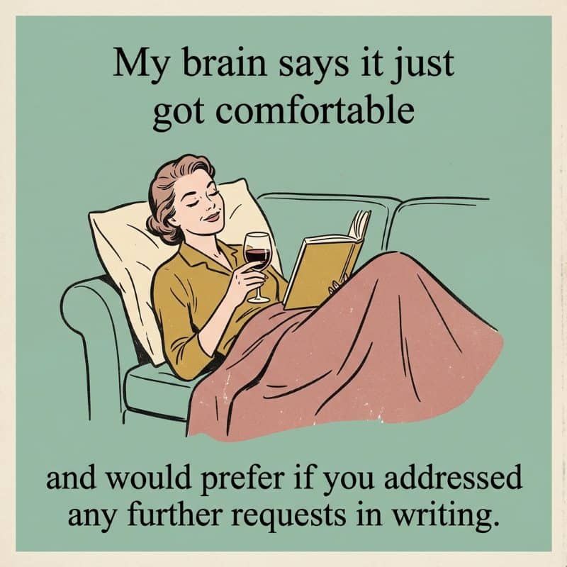 Image of a woman on the couch reading with a blanket and wine. Text reads: My brain says it just got comfortable and would prefer if you addressed any further requests in writing.