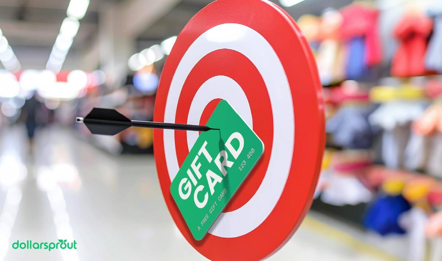 Bullseye target with a green gift card and black arrow, symbolizing hitting your goal with free Target gift cards.