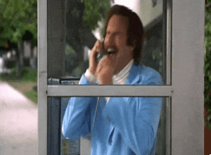 Will Ferrell as Ron Burgundy from Anchorman has a crying, flailing breakdown in a "glass case of emotion", otherwise known as a phone booth.