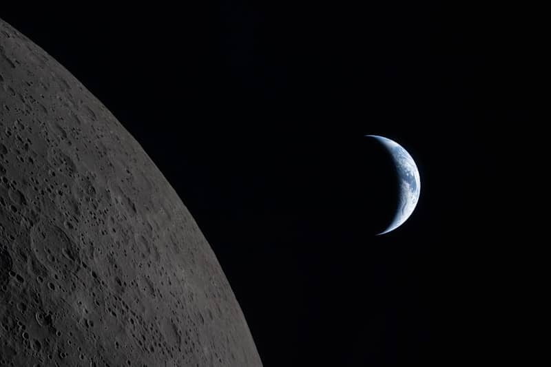Crescent earth seen from the moon's surface