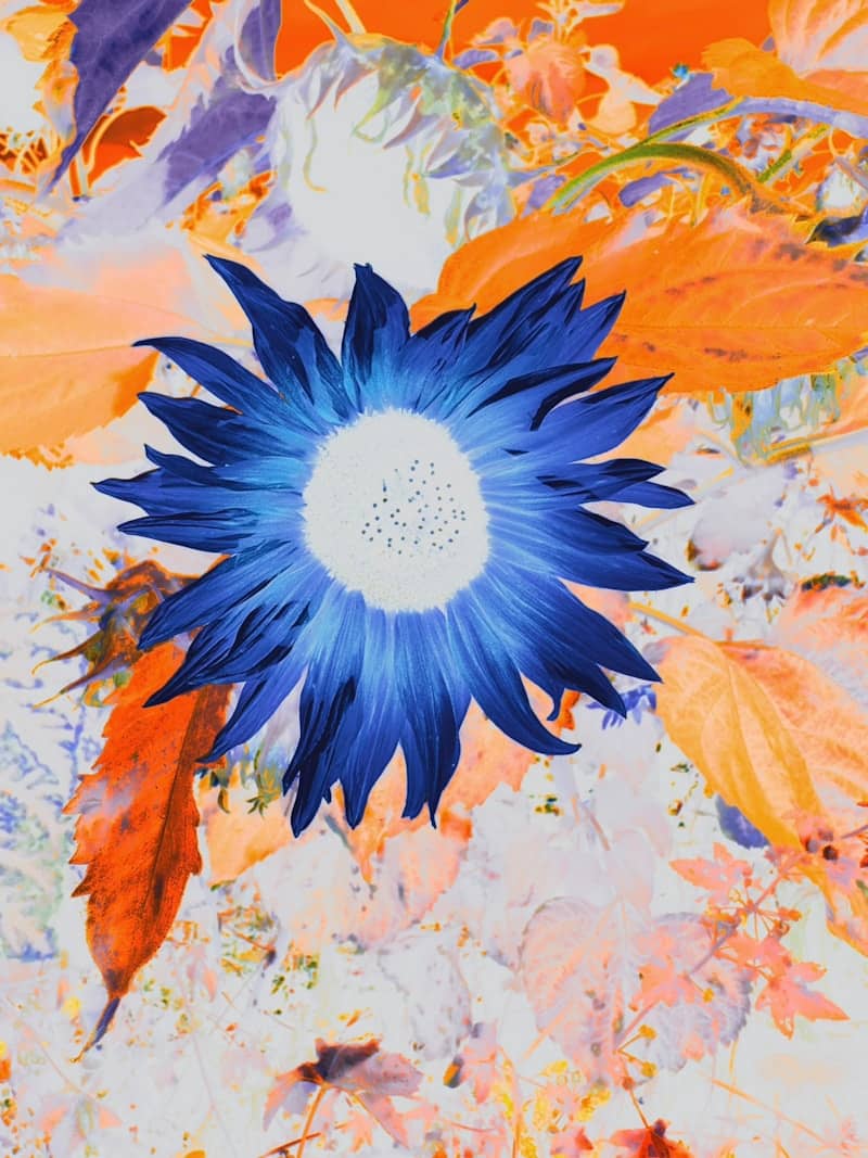 A painting of a blue flower surrounded by leaves