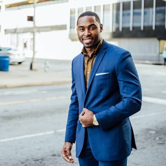 man in blue formal suit