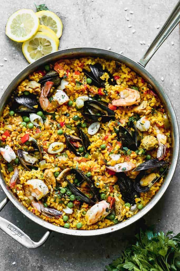 Paella mixta in a large skillet.