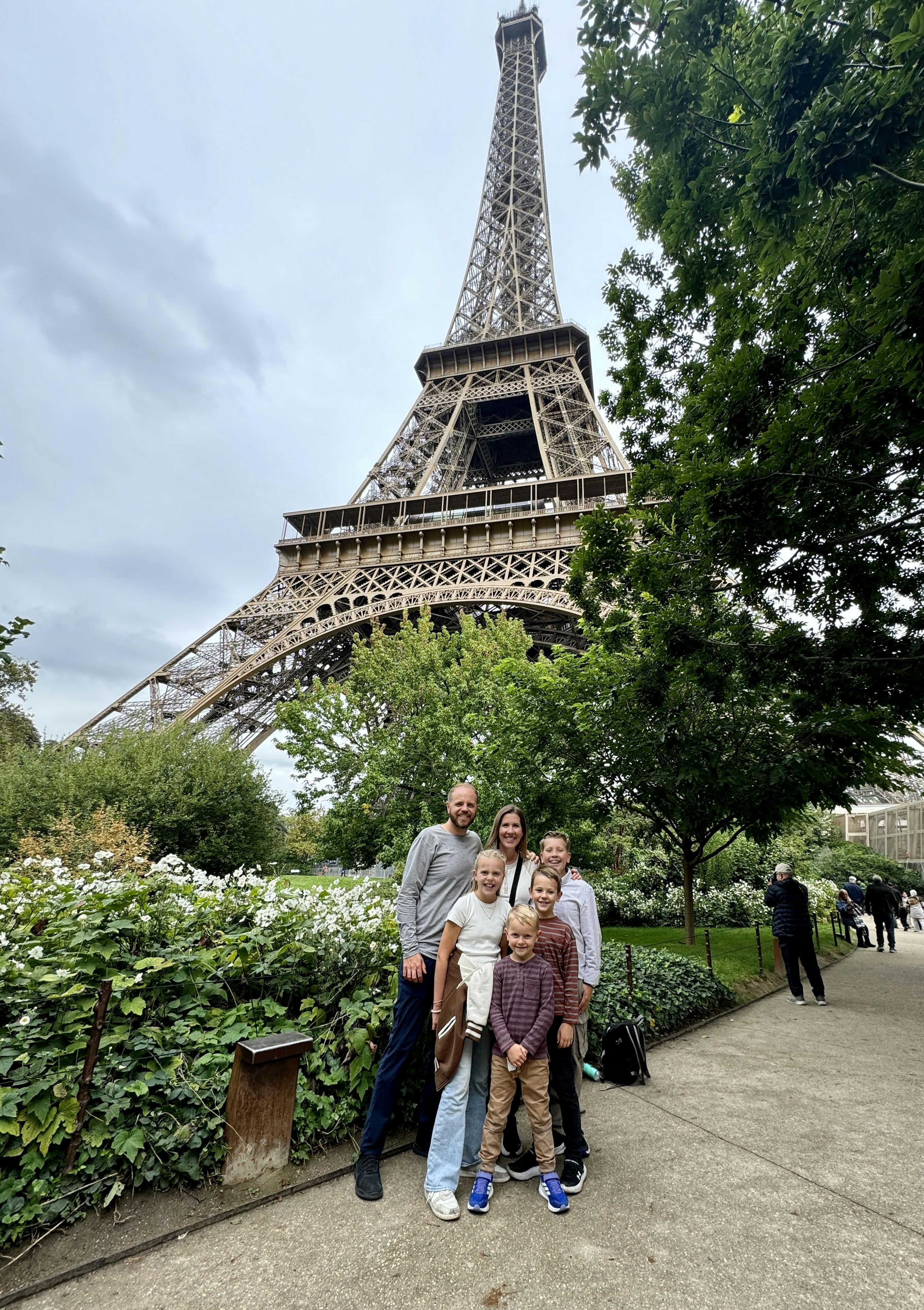 Allen family stranding in front of the Eiffel Tower, in Paris.