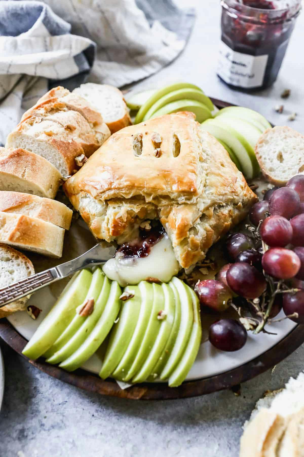 Baked Bree spread with fruit and bread