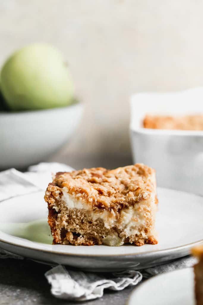apple coffee cake on a white plate