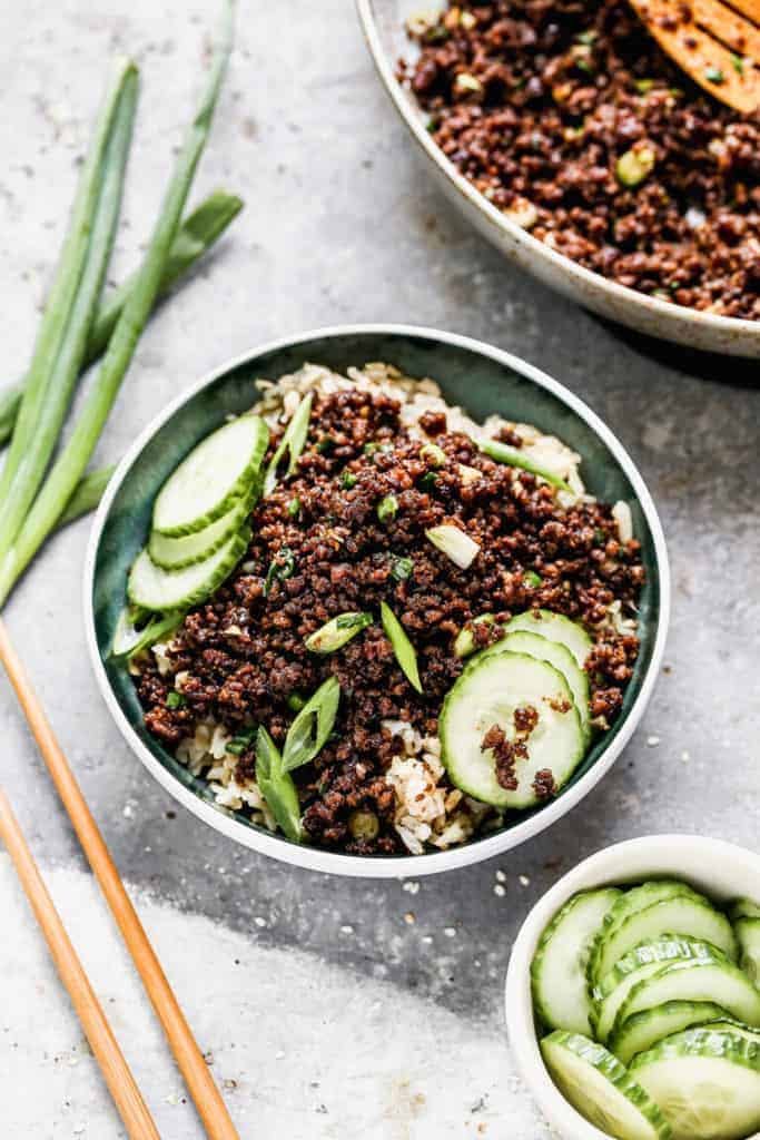 Korean beef in a bowl with chop sticks