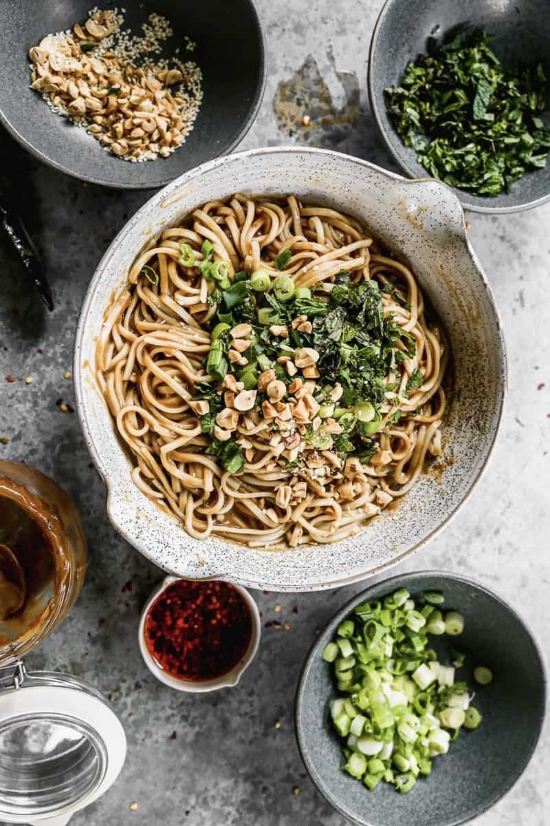 Peanut noodles served in a grey bowl