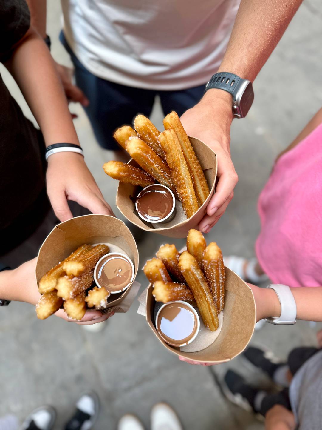 Enjoying churros and chocolate.