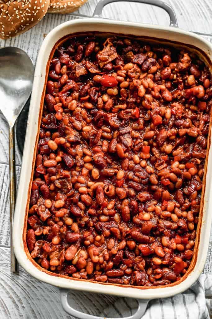 Baked Beans served in a white rectangle baking dish 