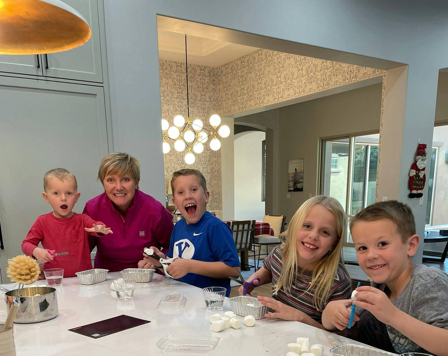 Grandma and the kids making rocky road!