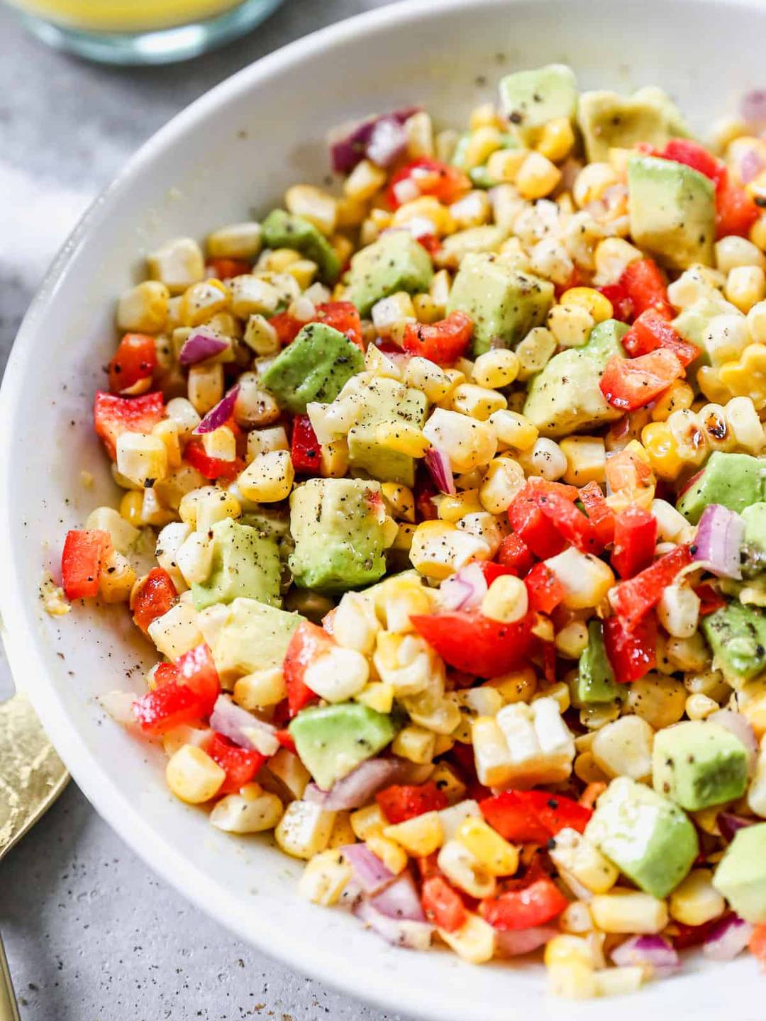 Corn Salad served in a white bowl. 