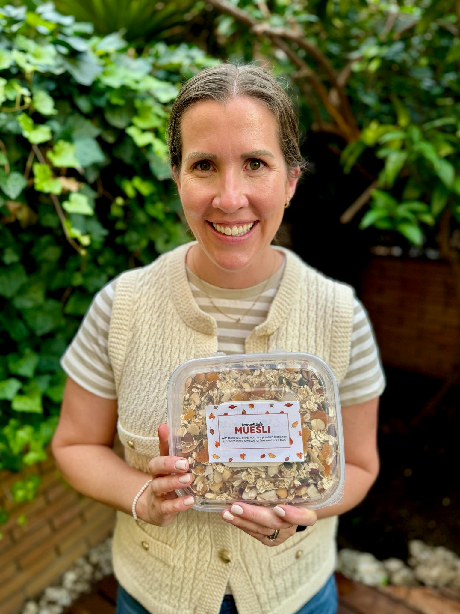 Lauren holding Muesli gift.