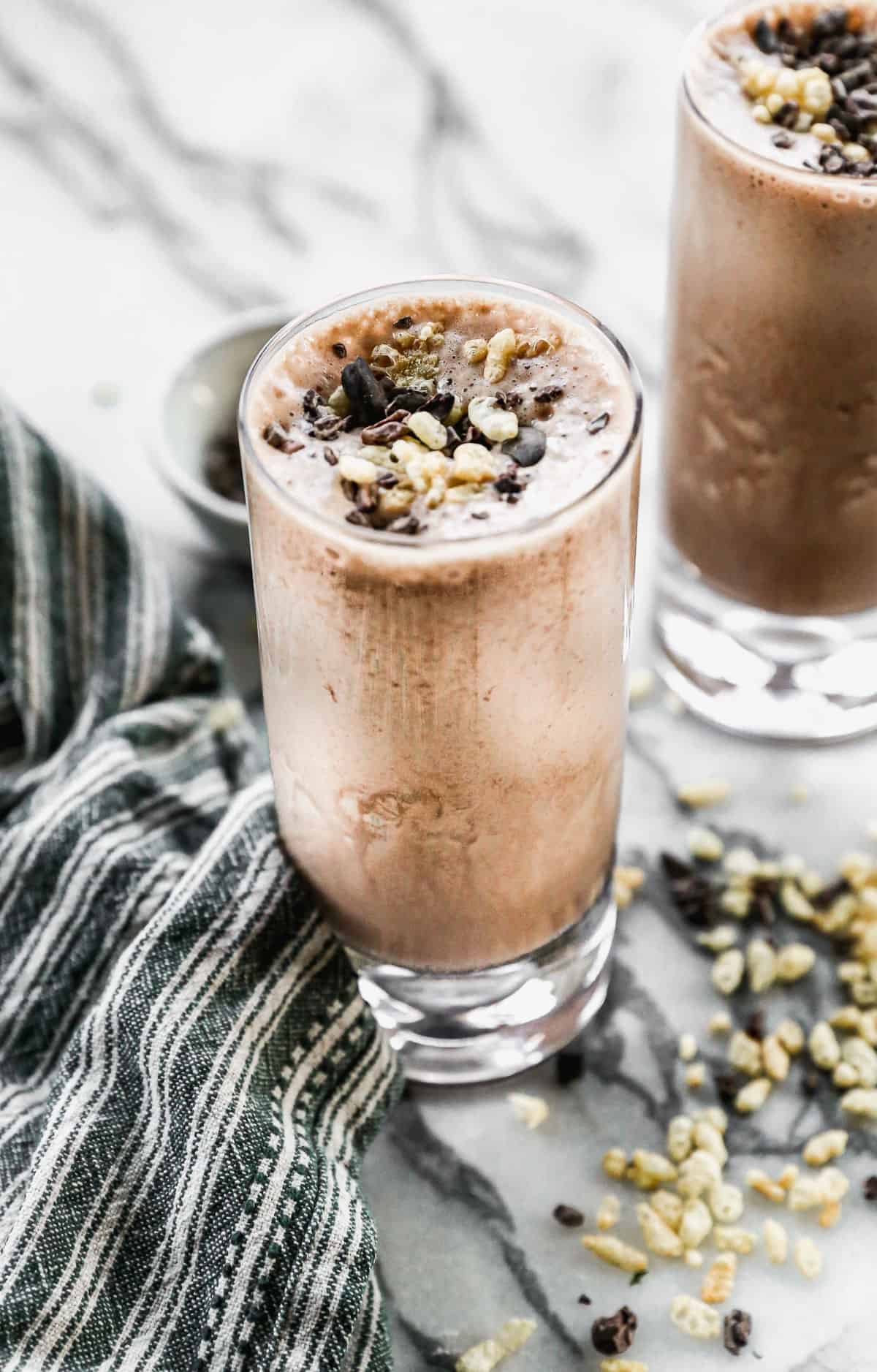 Chocolate Protein Shake topped with chocolate chips and rice cereal 