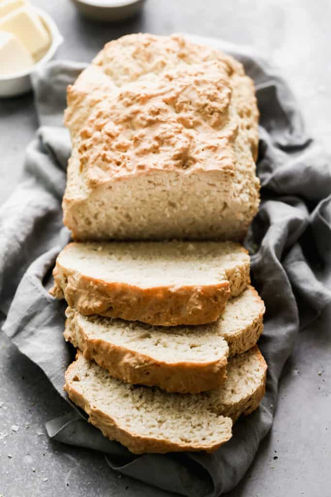 Beer Bread sliced and displayed on a grey cloth