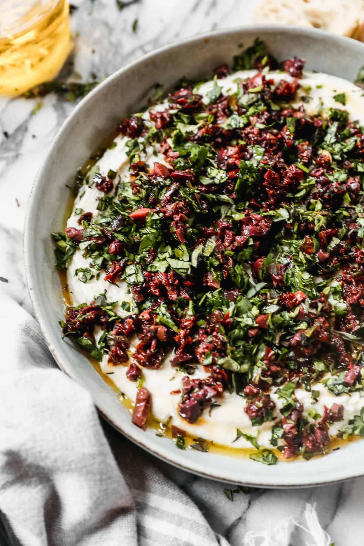 Whipped Goat Cheese served in a grey bowl