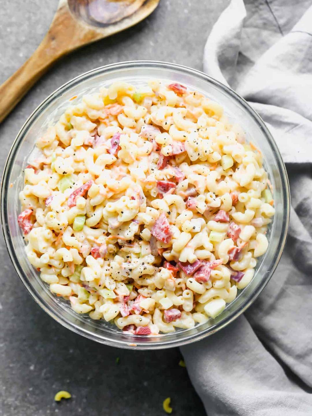 Macaroni Salad served in a glass bowl. 