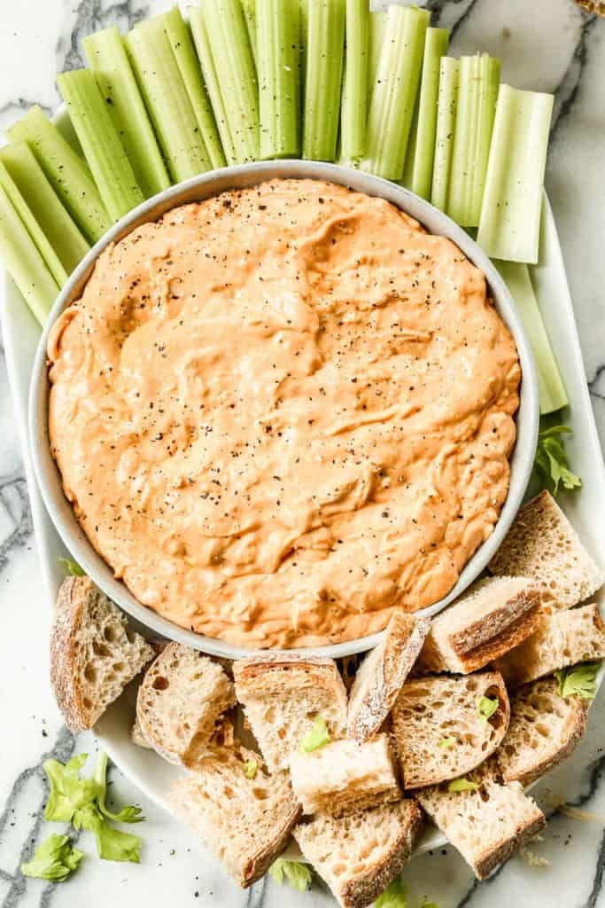 Buffalo Chicken Dip served with celery and bread