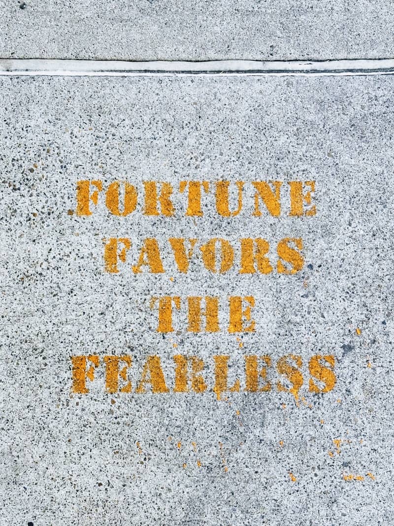 a sidewalk with a message written on it
