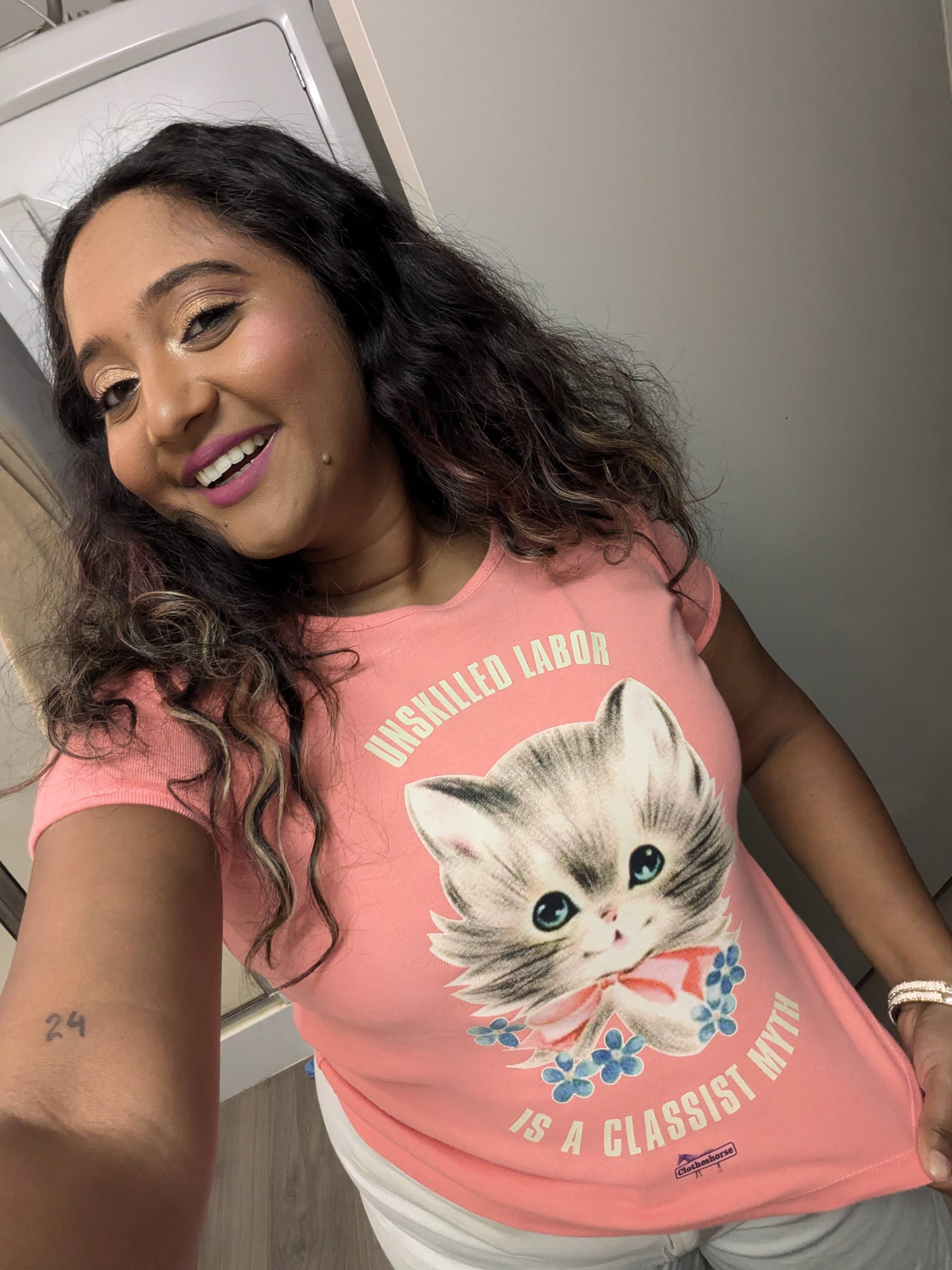 A shirt with a cute cat that says UNSKILLED LABOR IS A CLASSIST MYTH