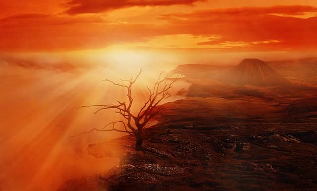 an image of sunrise over a volcano
