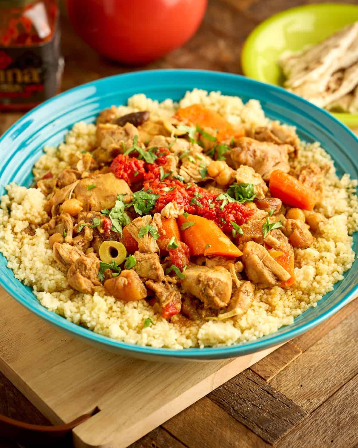 A bowl of chicken tagine on couscous