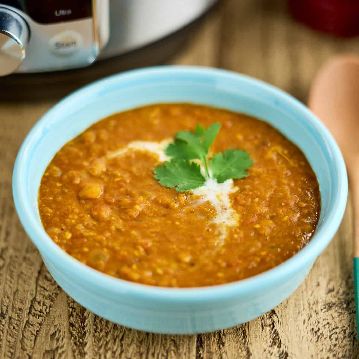 A bowl of red lentil soup