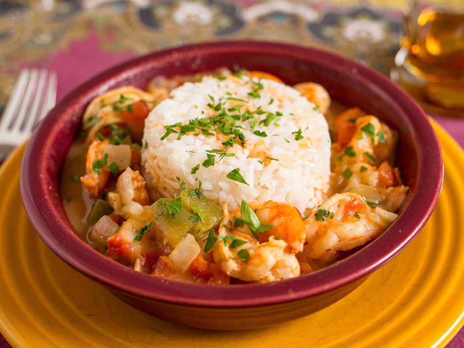 A bowl of shrimp etouffee with rice
