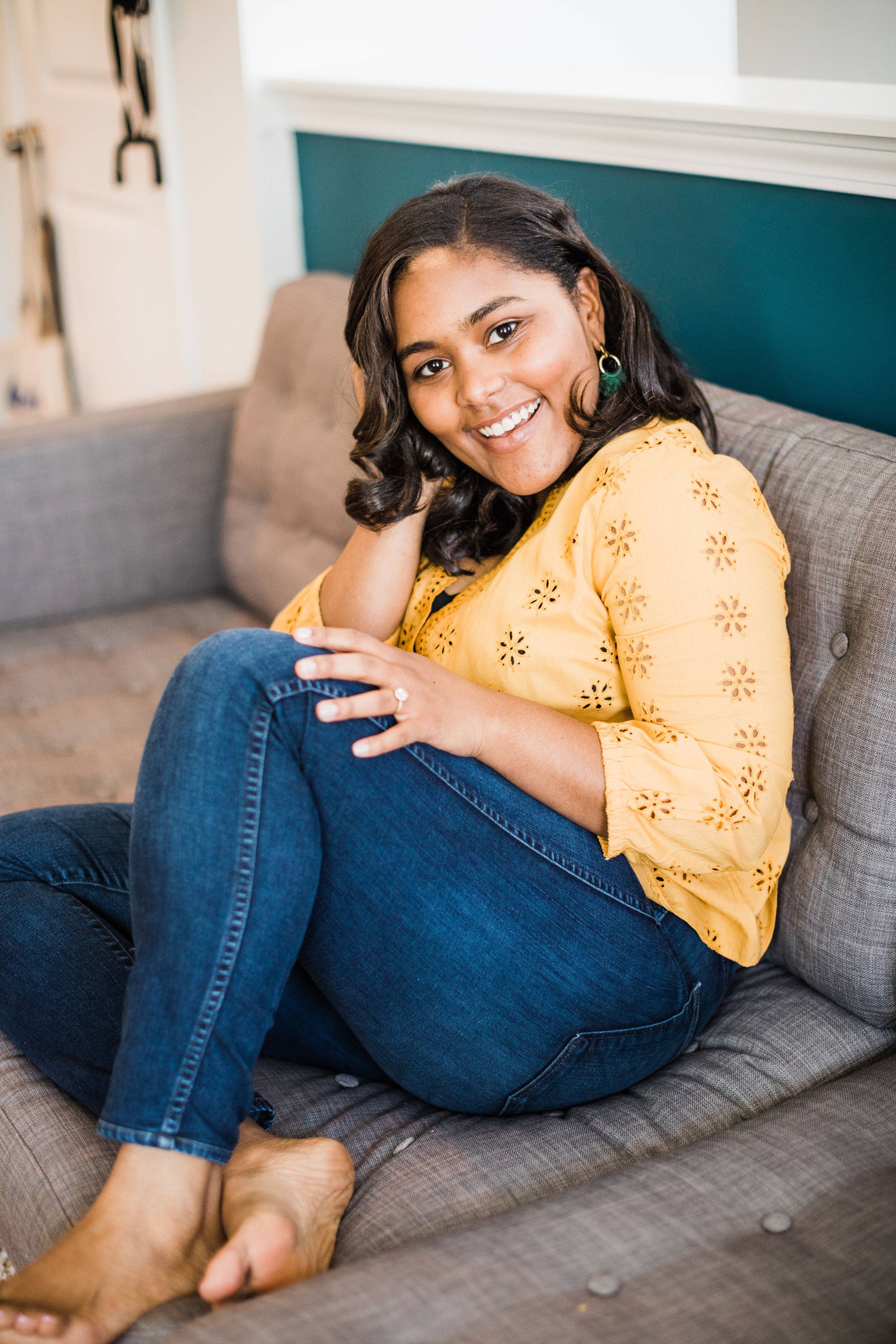 ashlea sitting on couch