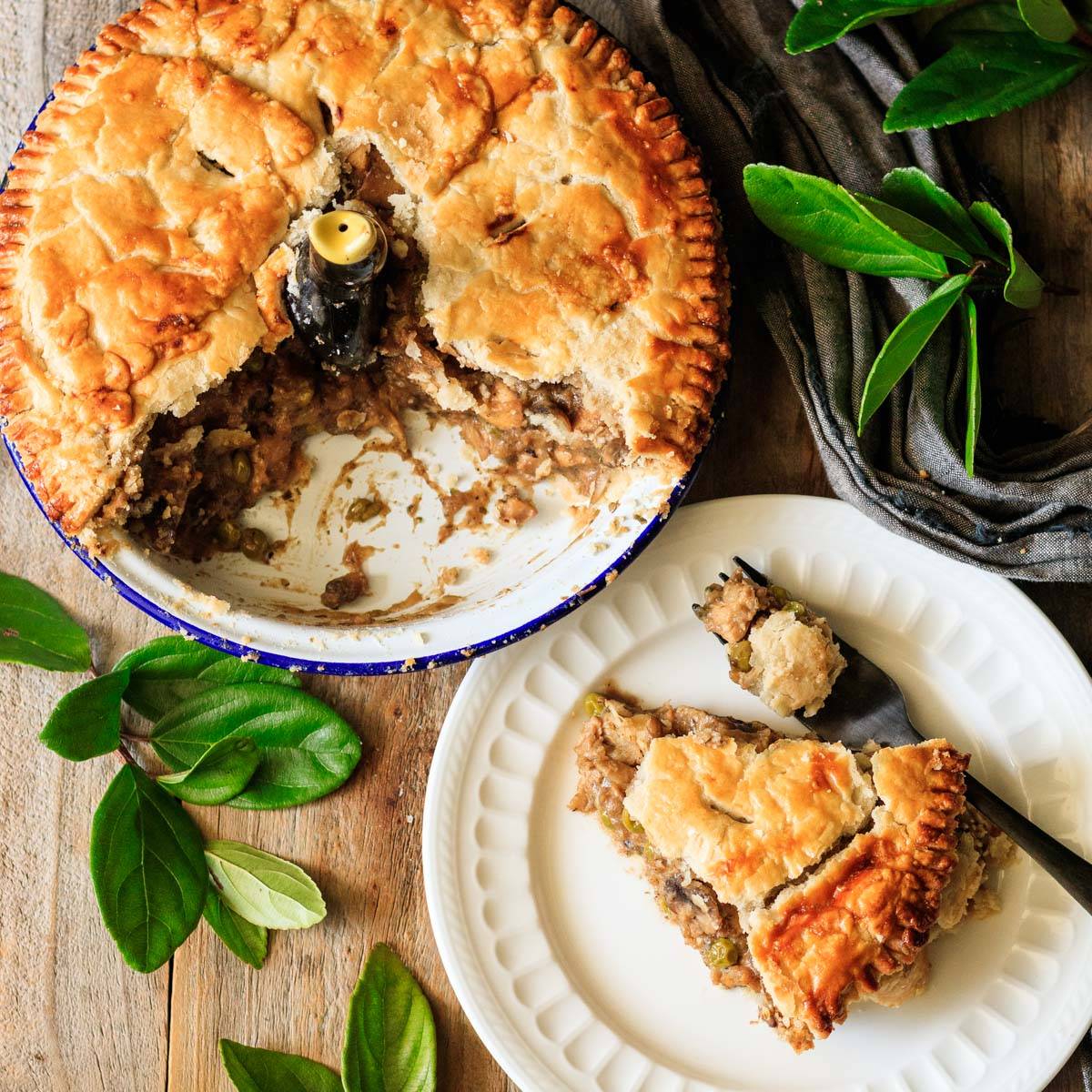 slice of chicken and mushroom pie with the pie.