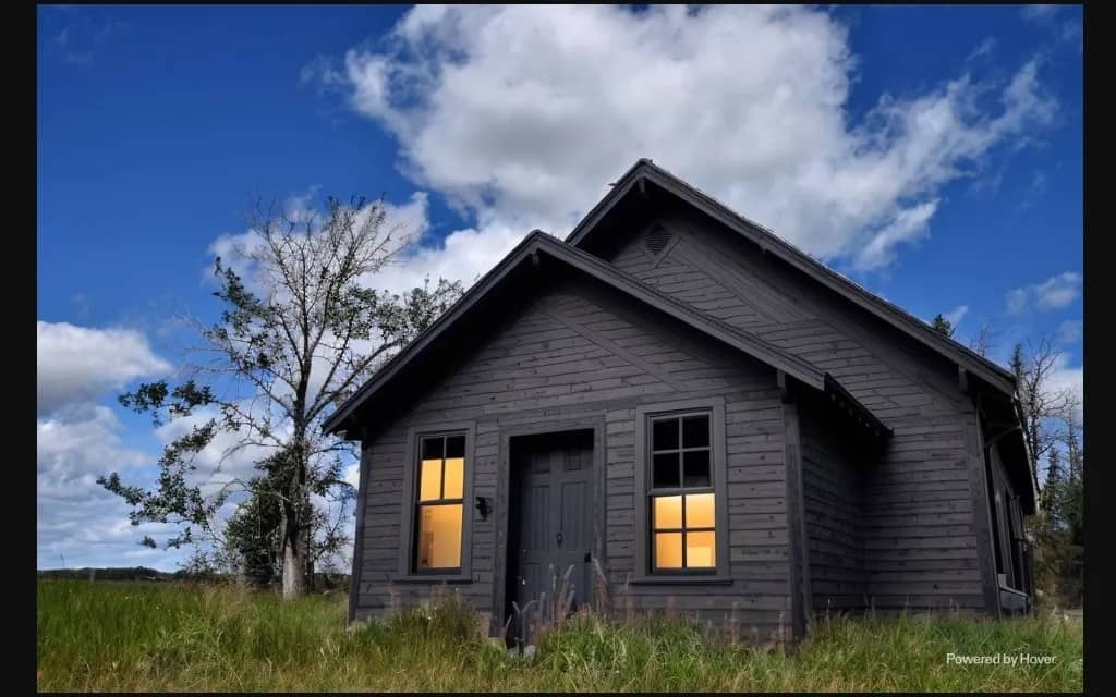 Hover AI rendering of an old run down white farmhouse