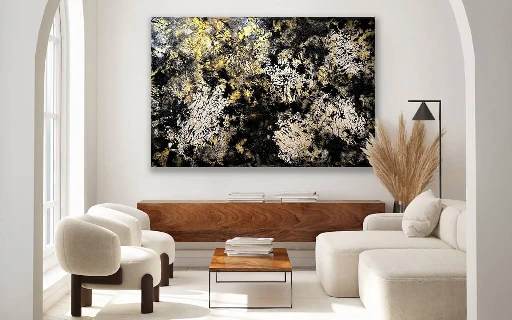 Mixed-media painting by artist Jennifer Rae Ochs in a white seating room