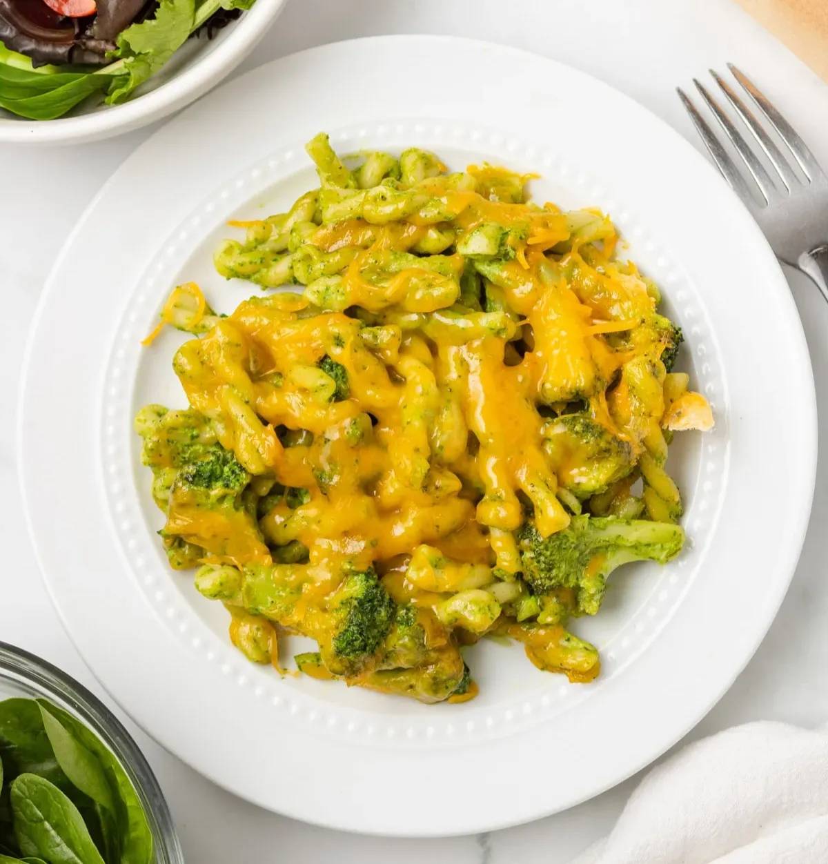 An overhead image of a serving of green goddess pasta bake on a plate.