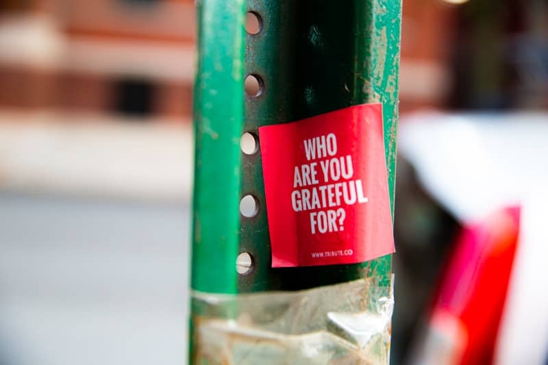 Red sticker asks "who are you grateful for?"
