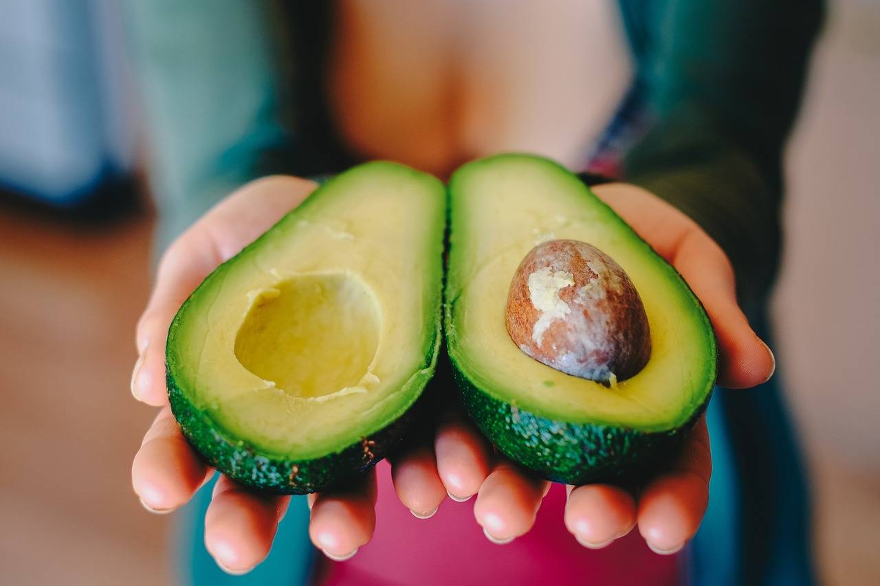The "Avocado Alchemy: Embracing the Magic of Nature’s Green Gem" webpage on Hedge Witch Cottage explores the nutritional benefits and magical properties of avocados. It covers their rich content of healthy fats, vitamins, minerals, fiber, and antioxidants