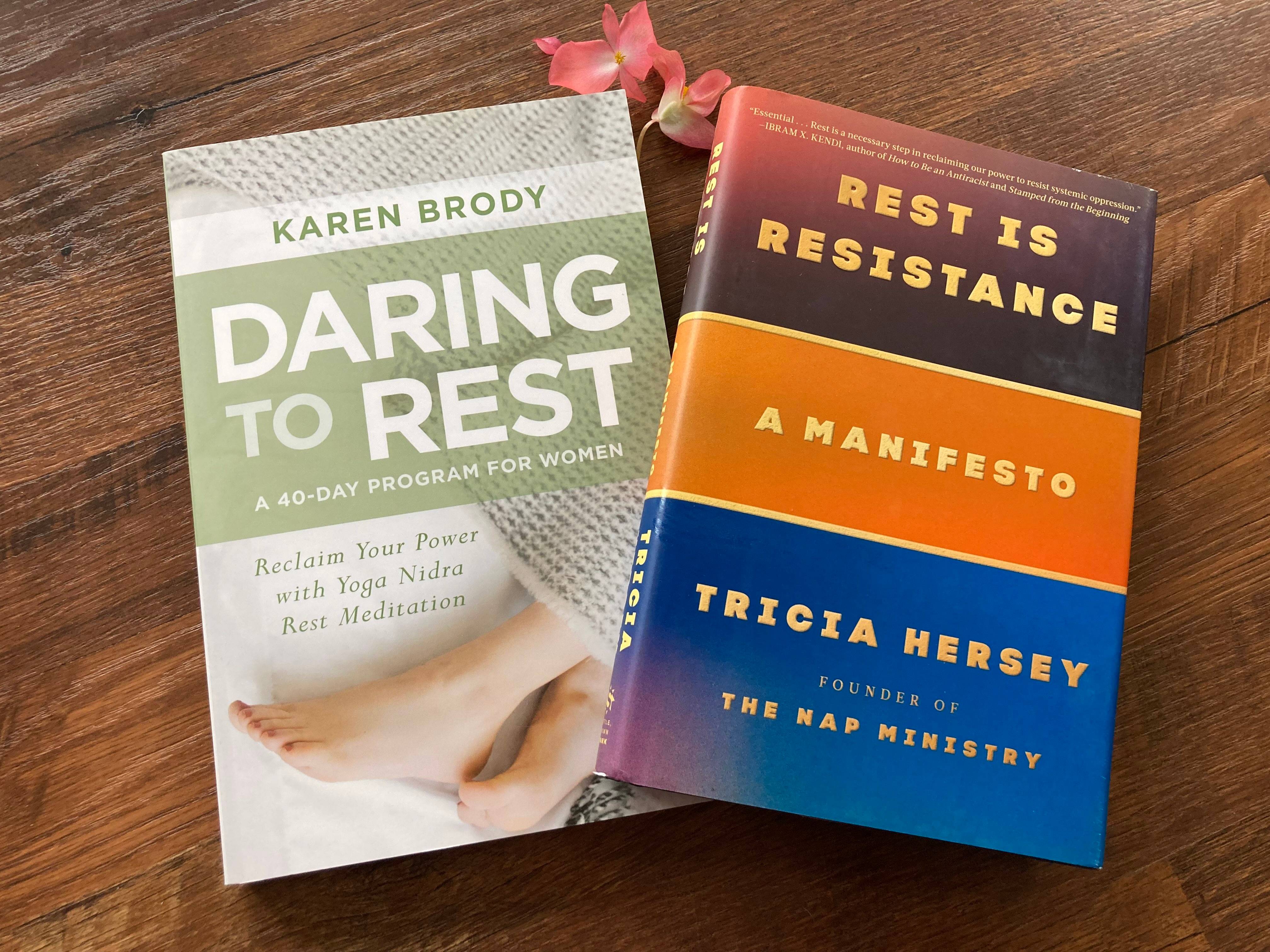 An image of two books against a wood background. Daring to Rest and Rest is Resistance.