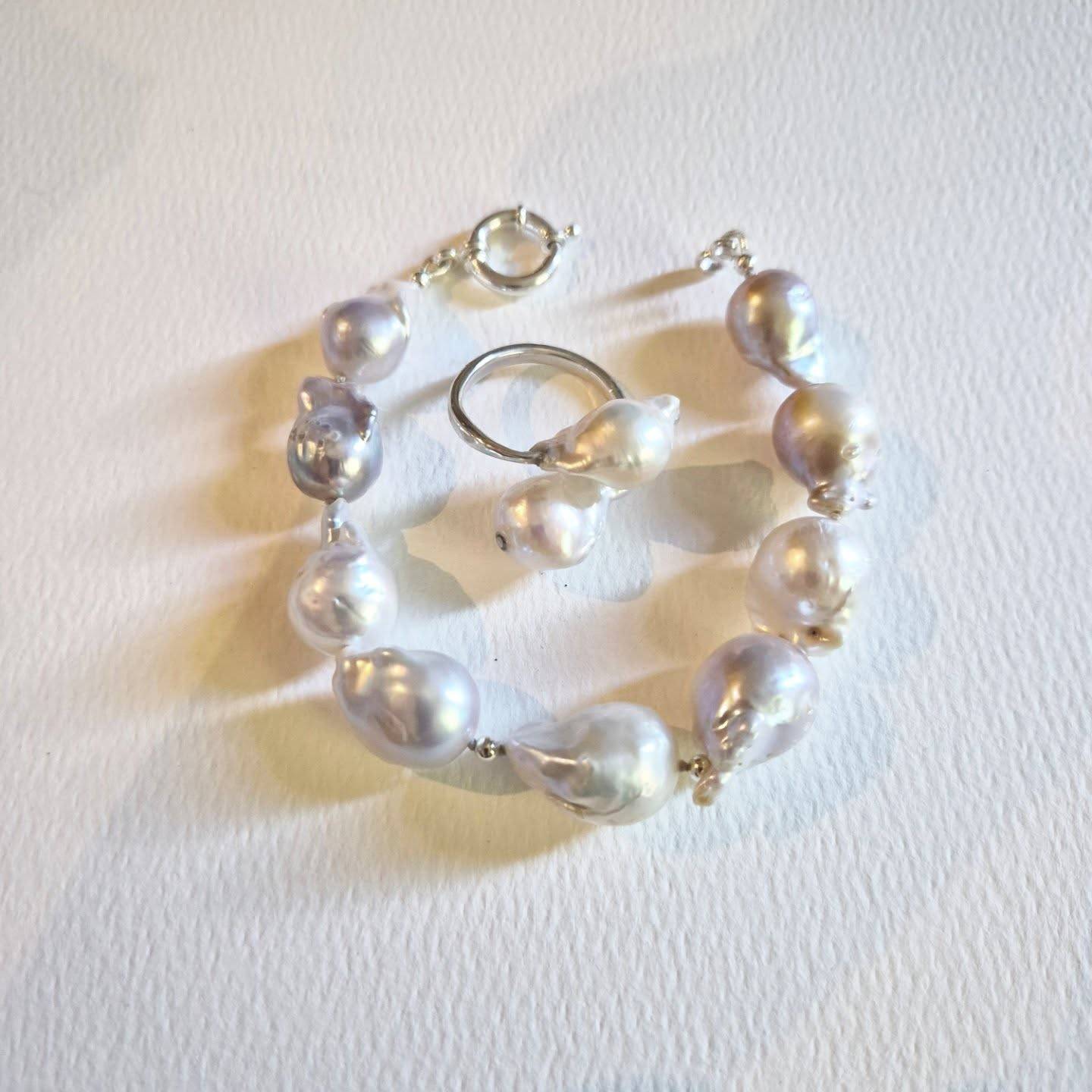Knotting pearls is definitely not my favourite pastime 😅 and I’m still learning with every piece, but this bracelet already came out so much better than my very first attempt. There’s something special about slowly hand knotting each pearl and seeing it all come together in the end.

This custom pearl bracelet and matching ring were made for a very dear client to wear to her sister’s baby shower. Pieces created not just to match an outfit, but to make her feel elegant, confident, and beautifully dressed for a meaningful day she’ll always remember.

16mm AA grade high lustre baroque pearls, individually knotted by hand and finished with sterling silver 🤍

I love creating jewellery for life’s special moments. Whether it’s a celebration, wedding, baby shower, anniversary, or simply a piece that makes you feel a little more like yourself when you wear it. Custom pieces always welcome.

#PearlJewellery #HandmadeJewelry #BaroquePearls #SterlingSilverJewelry #CustomJewellery